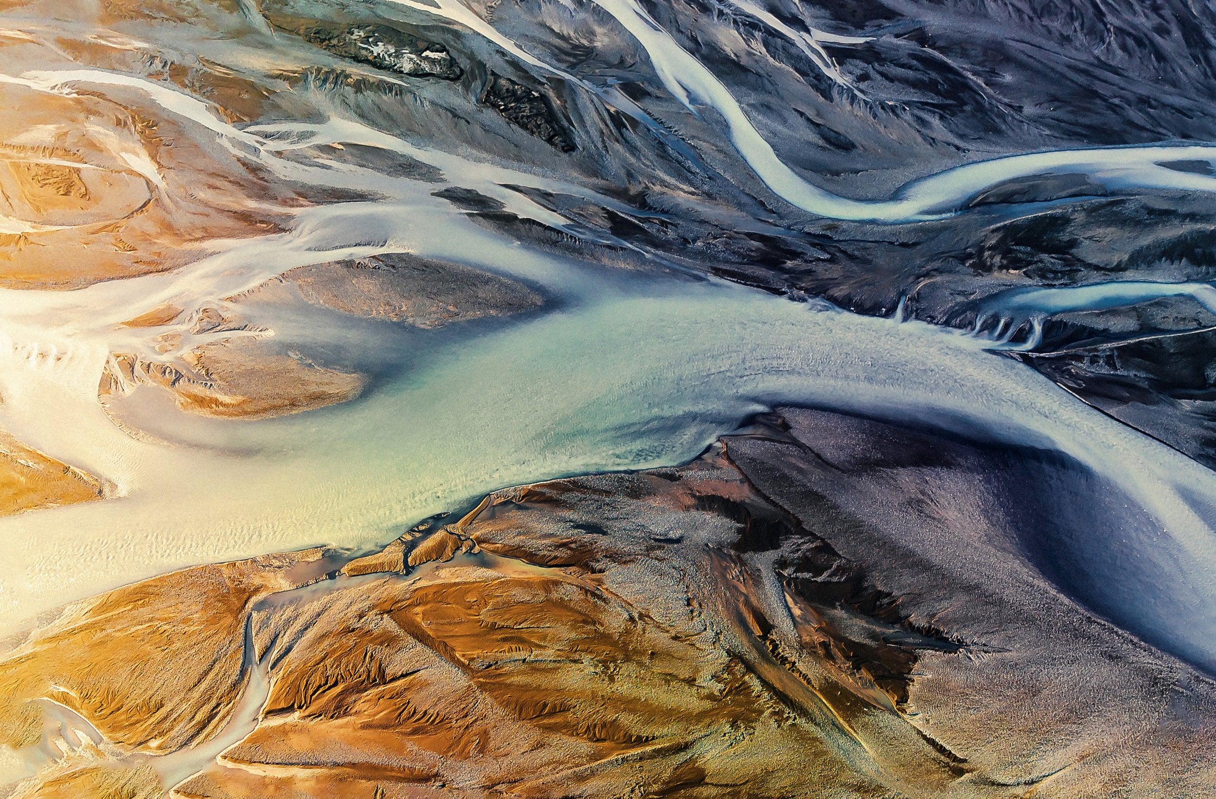 Nature's Artistry: Glacier Rivers at Dusk
