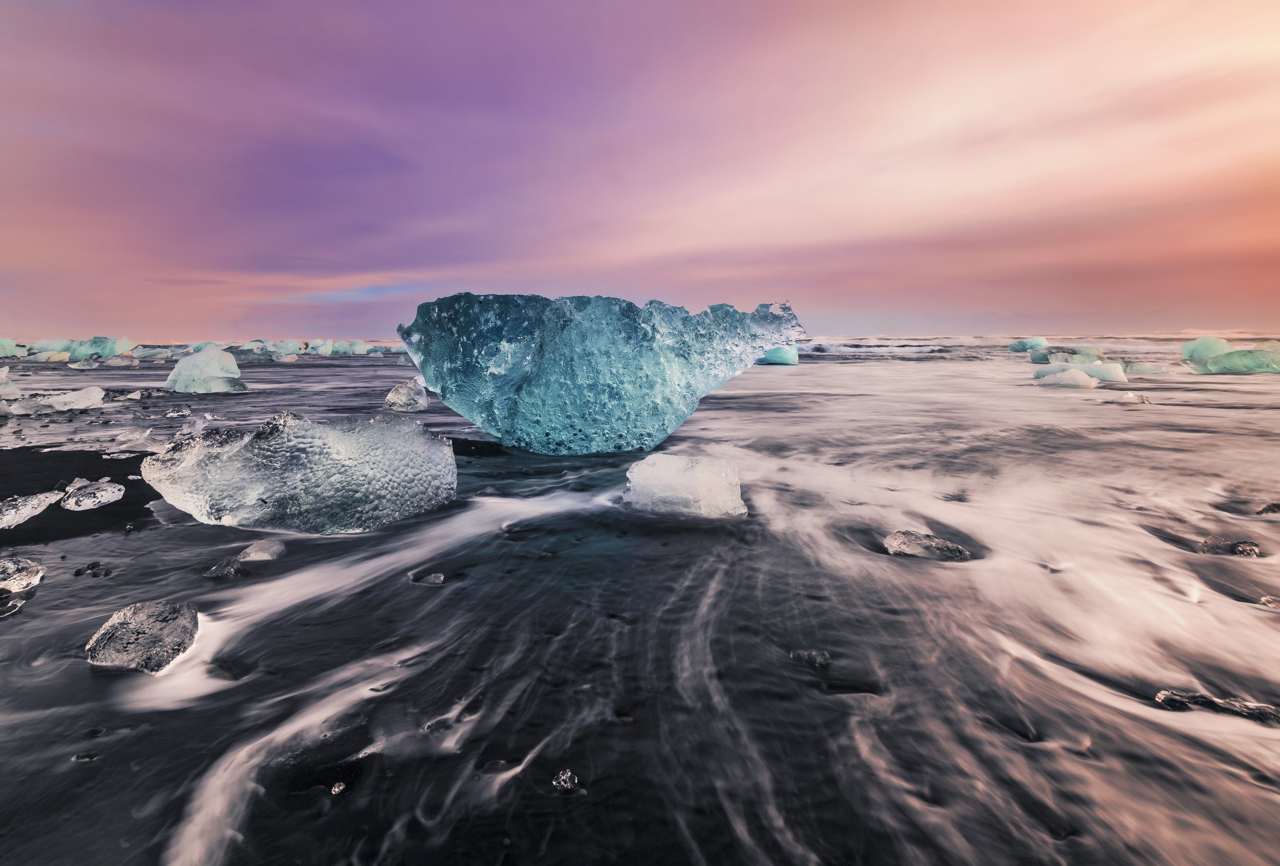 Blue &quot;Gemstone&quot; on black sand beach