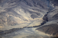 Wall mural Aerial View of the River on Tibet Plateau – fototapet med unikt motiv som skapar en inspirerande fondvägg