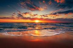 Wall mural Sea sunrise on the beach coast – fototapet med unikt motiv som skapar en inspirerande fondvägg