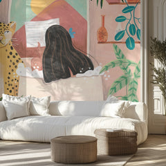 Woman taking bath in pink tropical bathroom