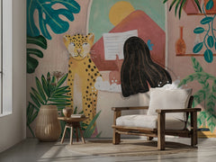 Woman taking bath in pink tropical bathroom