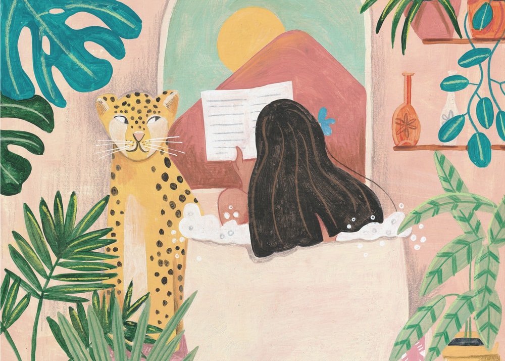 Woman taking bath in pink tropical bathroom