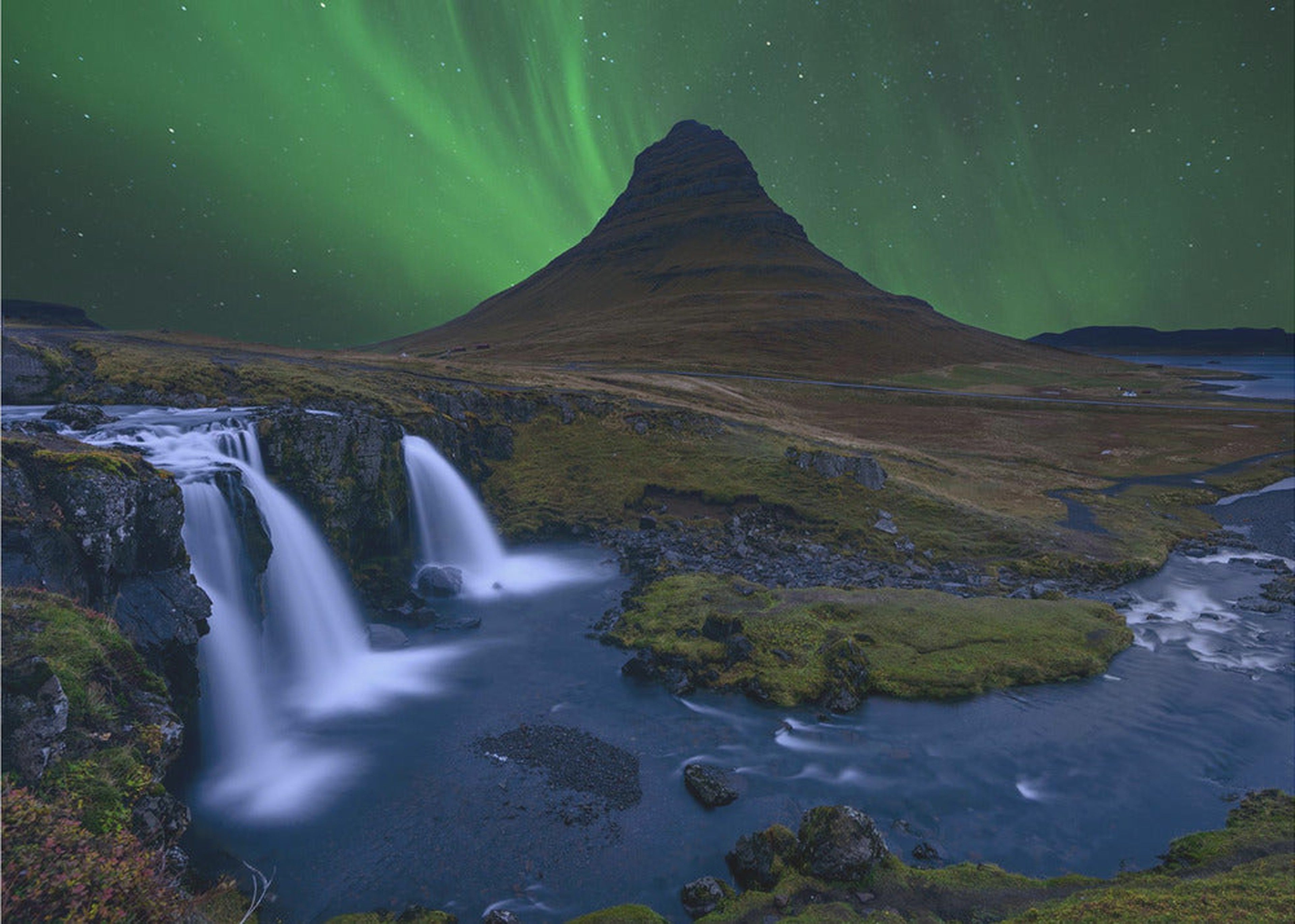 Kirkjufell...   Under a boreal green sky