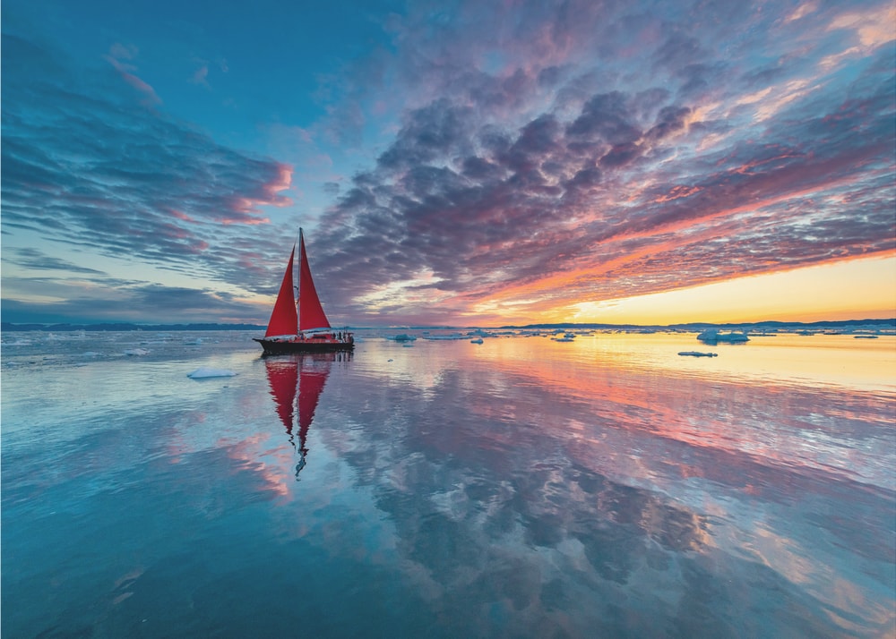 Red Sailboat Sunset Reflection