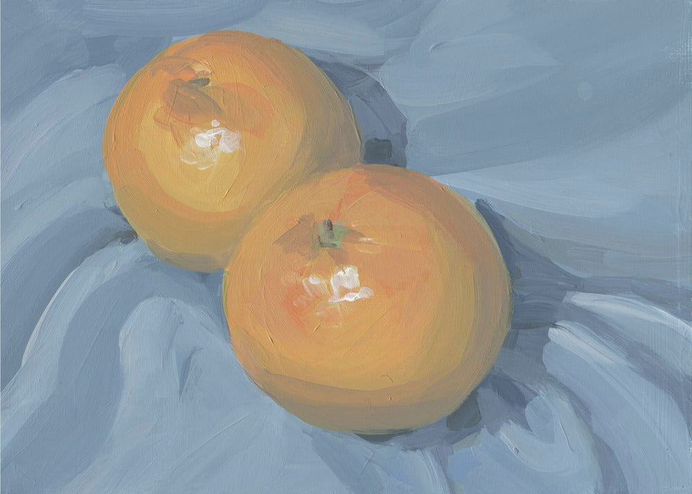 Appelsiner på blått