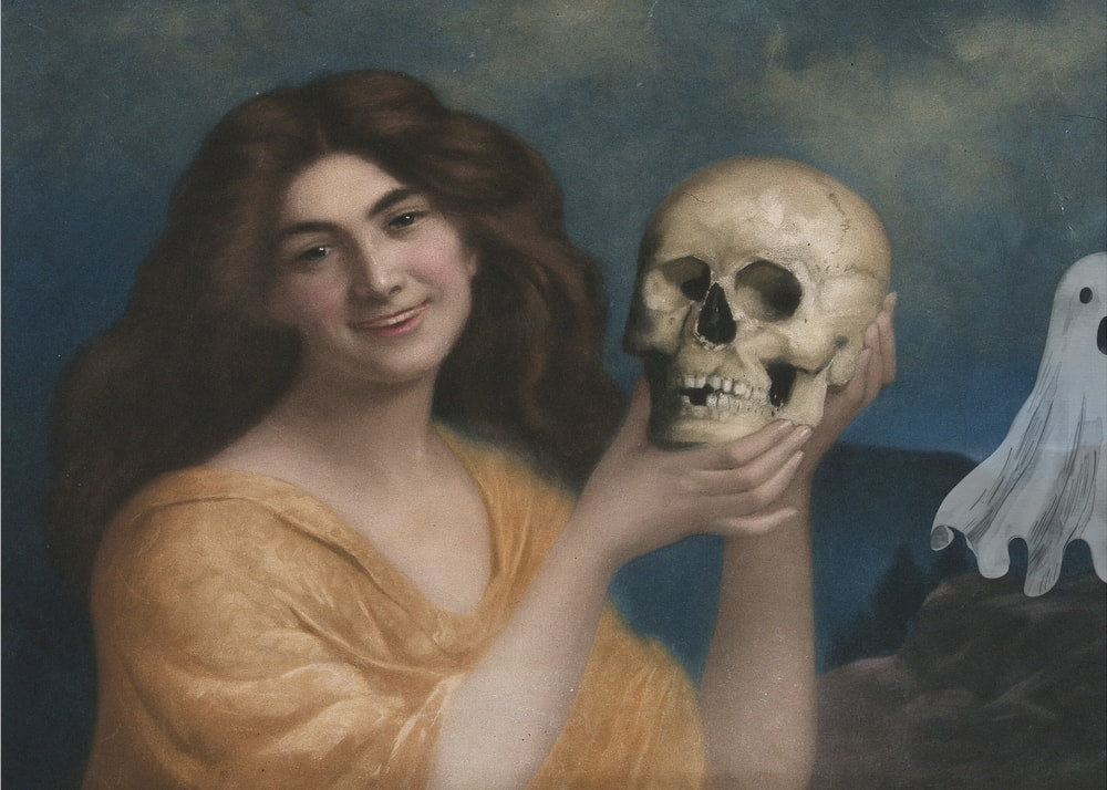 Smiling Woman Holding Skull