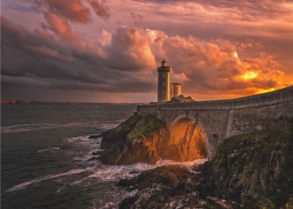 Stormy Lighthouse Sunset